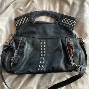 B. Makowsky black leather bag with silver studs and strap